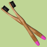 2 Natboo Toothbrushes. Pink + (another color)